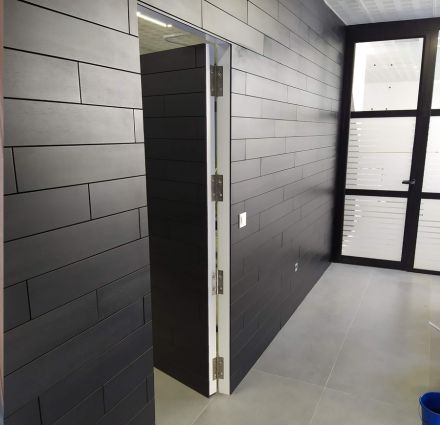 Puerta escamoteable